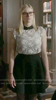 Alice's white lace top with black collar on The Magicians