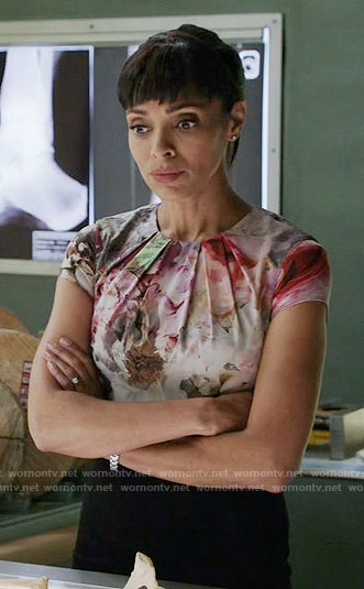Camille's floral cap sleeve dress with black skirt on Bones