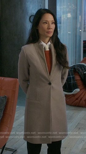 Joan's beige single-button coat on Elementary