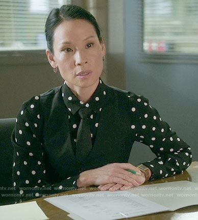 Joan's black polka dot shirt on Elementary
