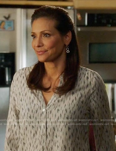 Regina's white printed v-neck blouse on Switched at Birth