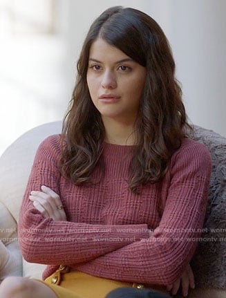 Sabrina's pink textured sweater and mustard front button skirt on The Mick