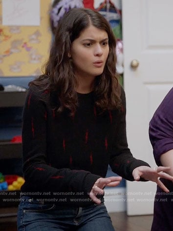 Sabrina's black and red lightning bolt print sweater on The Mick
