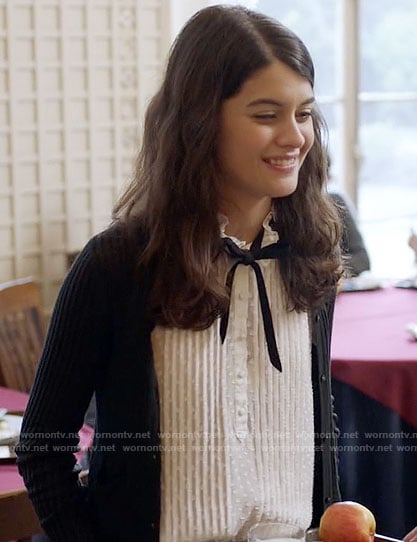 Sabrina's white pleated top with tie neck on The Mick