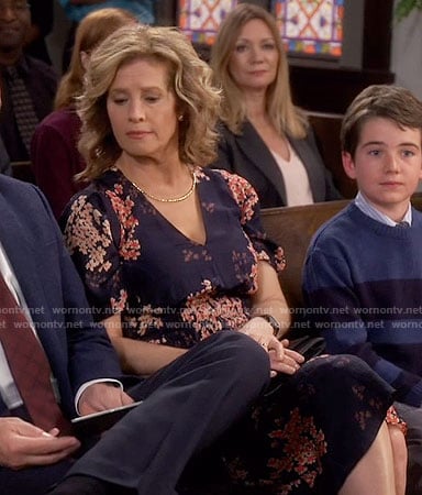 Vanessa's navy floral v-neck dress on Last Man Standing