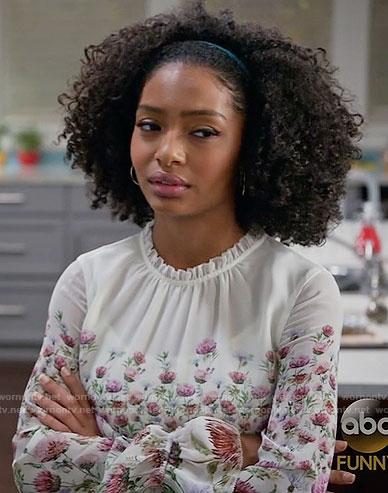 Zoey's white and pink floral top with ruffle neckline on Black-ish