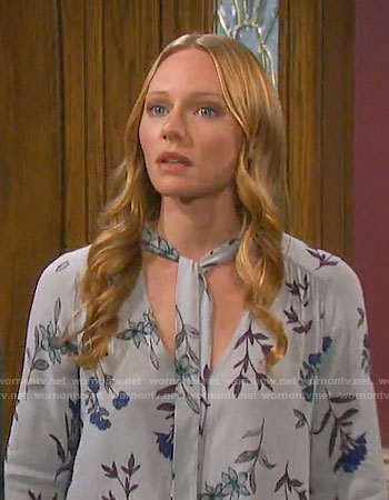 Abby's grey floral tie-neck blouse on Days of our Lives