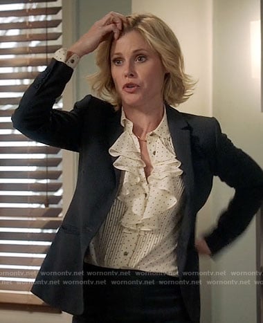 Claire's ruffled polka dot blouse on Modern Family