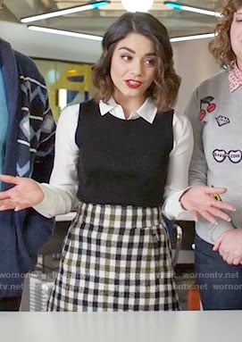Emily's checked skirt on Powerless