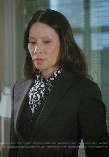 Joan's dog print blouse on Elementary