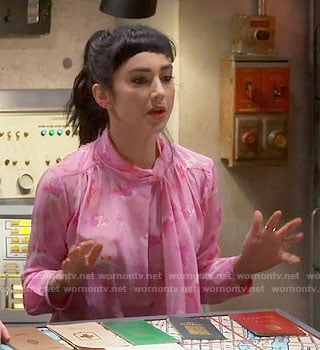 Mandy's pink printed tie-neck blouse on Last Man Standing