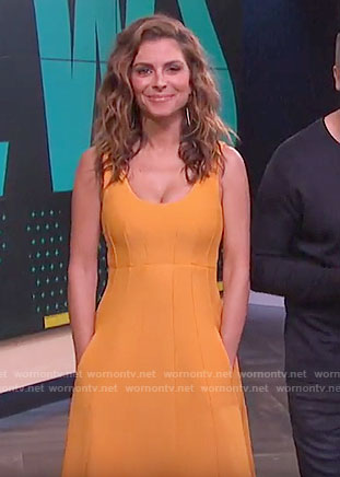 Maria's orange dress with pockets on E! News
