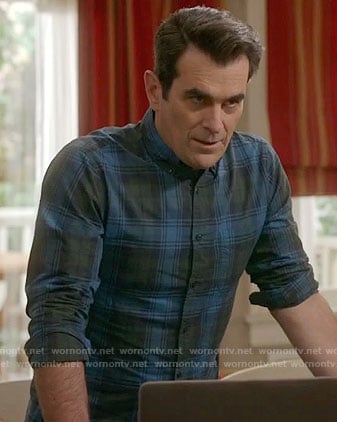 Phil's blue and green plaid shirt on Modern Family