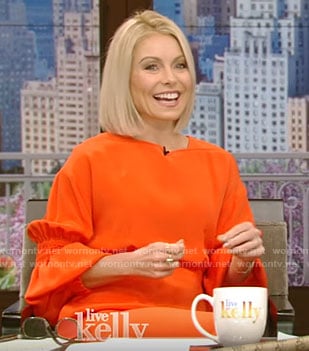 Kelly's orange balloon sleeve dress on Live With Kelly