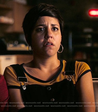 Annie's yellow top and black overalls on Girlboss