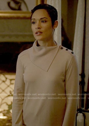 Anika's beige folded neck sweater on Empire