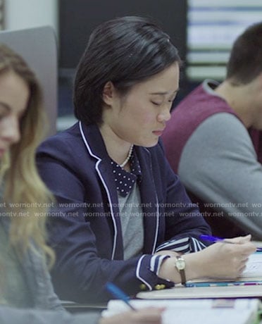 Courtney's navy blazer with white trim on 13 Reasons Why