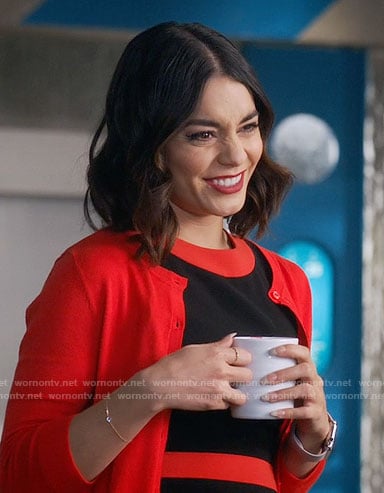 Emily's black dress with red trim on Powerless