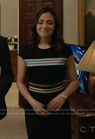 Emily's black dress with multi-colored stripes on Designated Survivor