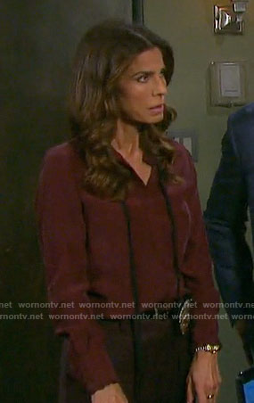 Hope's burgundy blouse with black neck tie on Days of our Lives