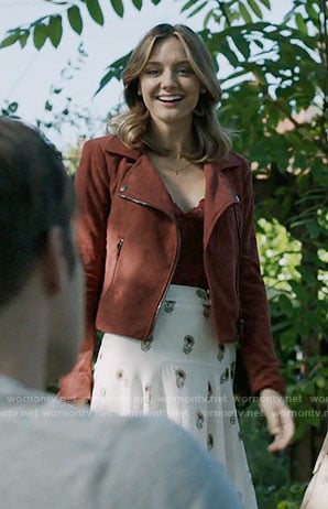 Megan's red suede moto jacket and white floral midi skirt on The Arrangement