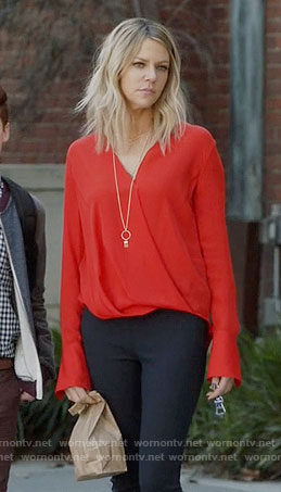 Mickey's red wrap blouse on The Mick