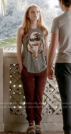 Paige's eagle and skull tank top on Famous in Love