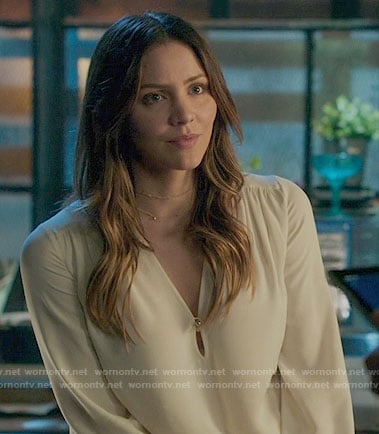 Paige's white v-neck blouse on Scorpion