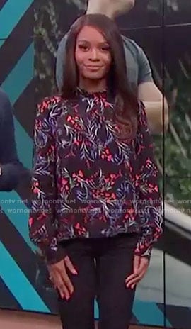 Zuri Hall's black floral blouse on E! News