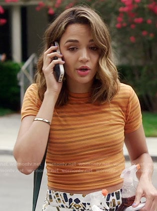 Cassie's orange striped top on Famous in Love