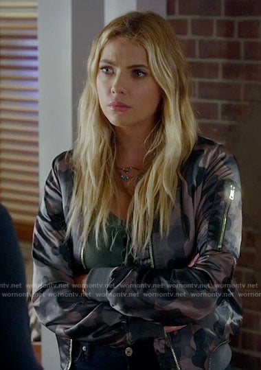 Hanna's lace-up top and camo bomber jacket on Pretty Little Liars