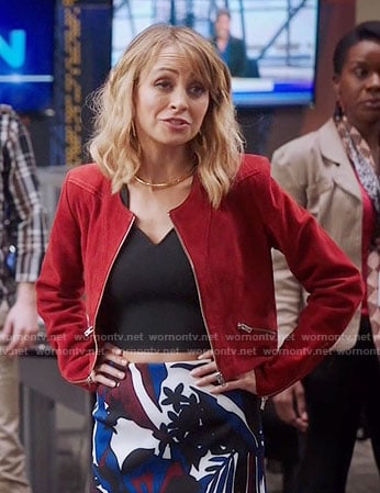 Portia's red suede jacket and floral pencil skirt on Great News