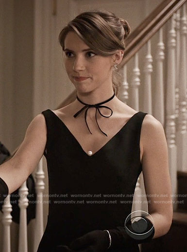 Stevie's black v-neck dress with pearl on Madam Secretary