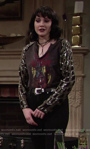 Tessa's black graphic tee with sequin sleeves on The Young and the Restless