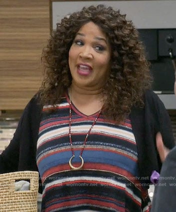 Yolanda's striped v-neck top on Young and Hungry