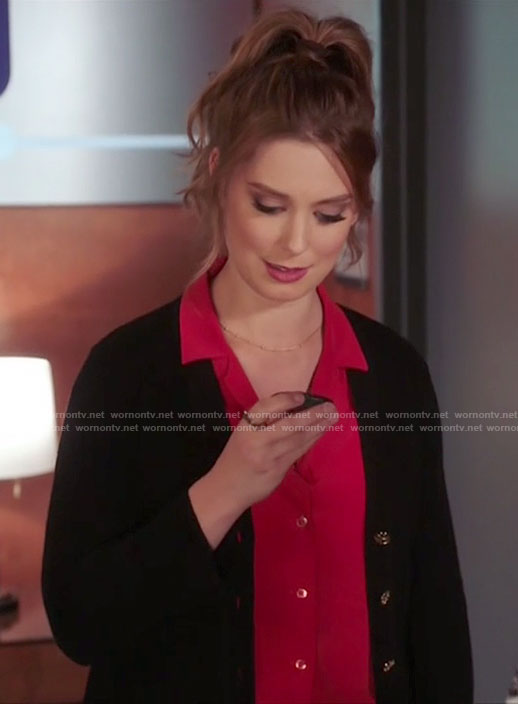 Katie's black cardigan on Great News