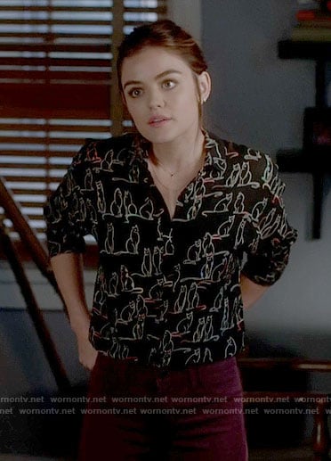 Aria's black cat print shirt on Pretty Little Liars