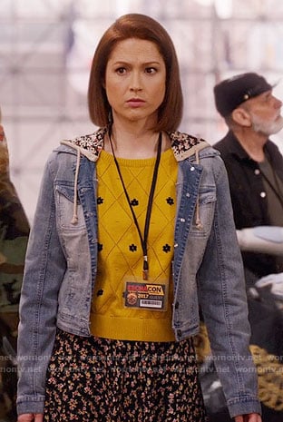 Kimmy's yellow daisy sweater and hooded denim jacket on Unbreakable Kimmy Schmidt