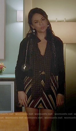 Mona's brown tie neck blouse and striped skirt on Pretty Little Liars