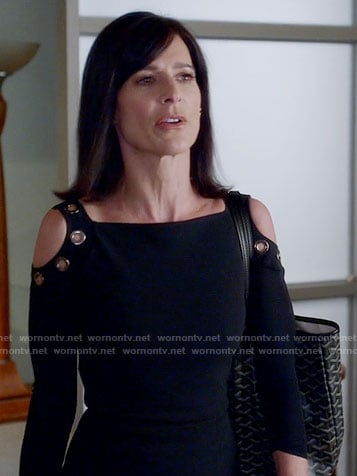 Nina's black cold-shoulder dress with eyelets on Famous in Love
