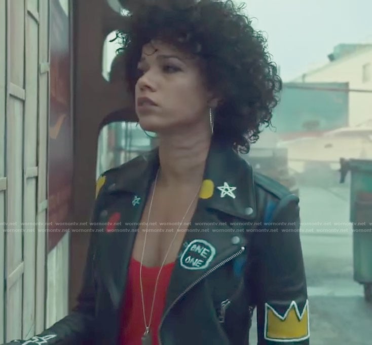 Maia's black graffiti moto jacket and red camisole on Shadowhunters