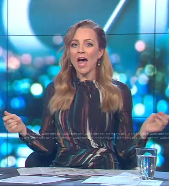Carrie's black striped mini dress on The Project
