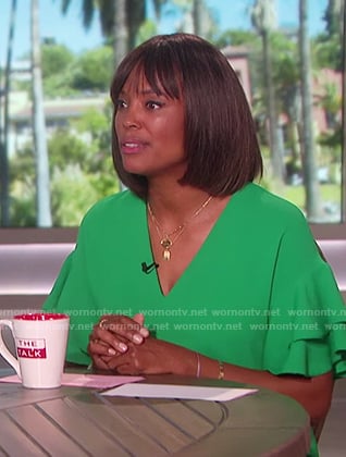 Aisha's green frilled sleeve dress on The Talk