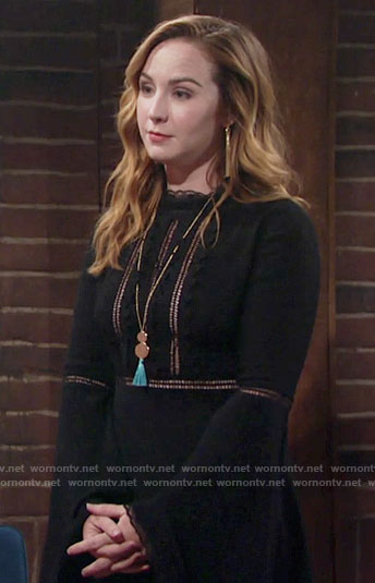 Mariah's black bell-sleeve dress and blue tassel necklace on The Young and the Restless