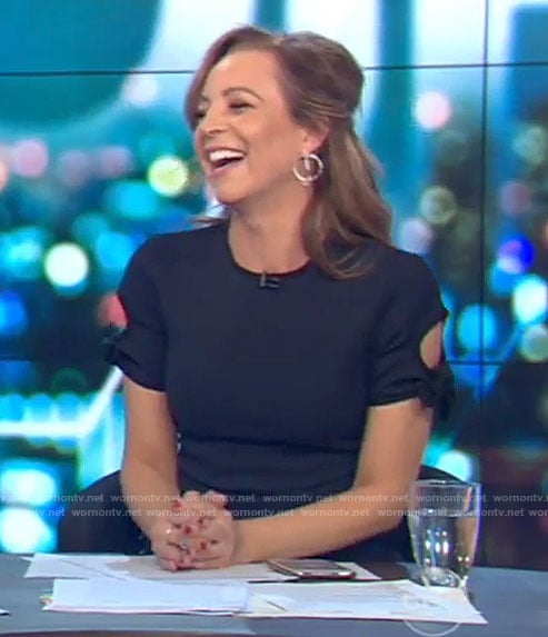 Carrie's navy tie sleeve dress on The Project