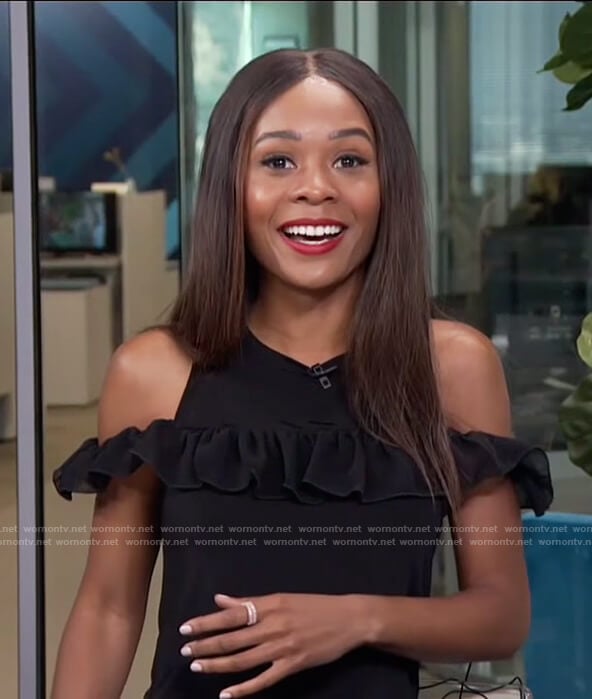 Zuri's black cold shoulder ruffle top on E! News