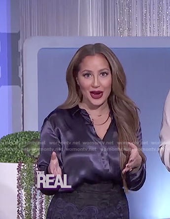 Adrienne's black satin blouse and embroidered skirt on The Real