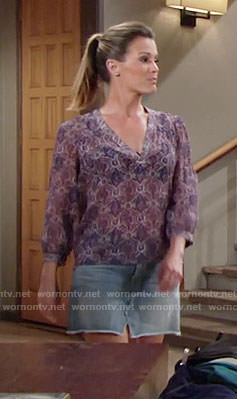 Chelsea's purple v-neck top and denim skirt on The Young and the Restless