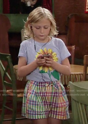 Faith's sunflower tee and checked shorts on The Young and the Restless