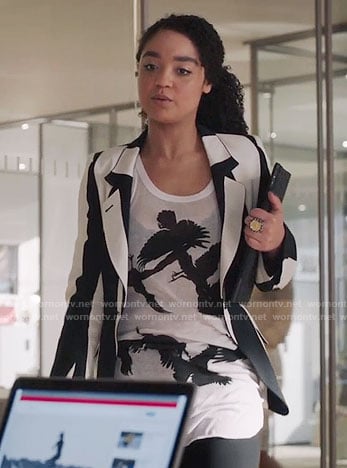 Kat's black and white bird print top and striped jacket on The Bold Type